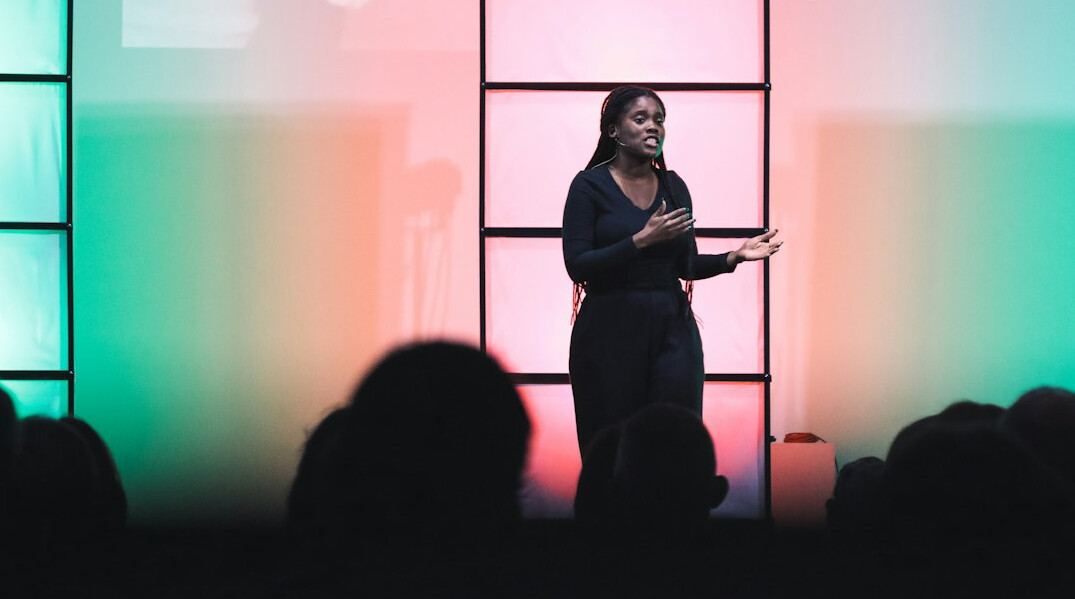 person giving presentation on stage
