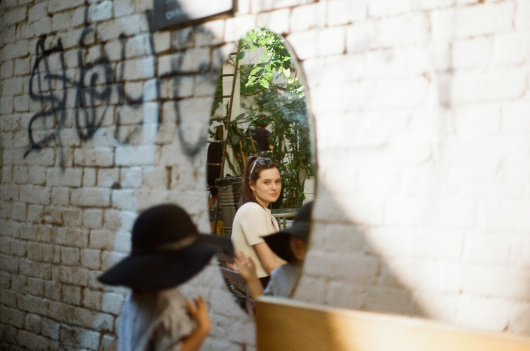 woman practicing speech in mirror