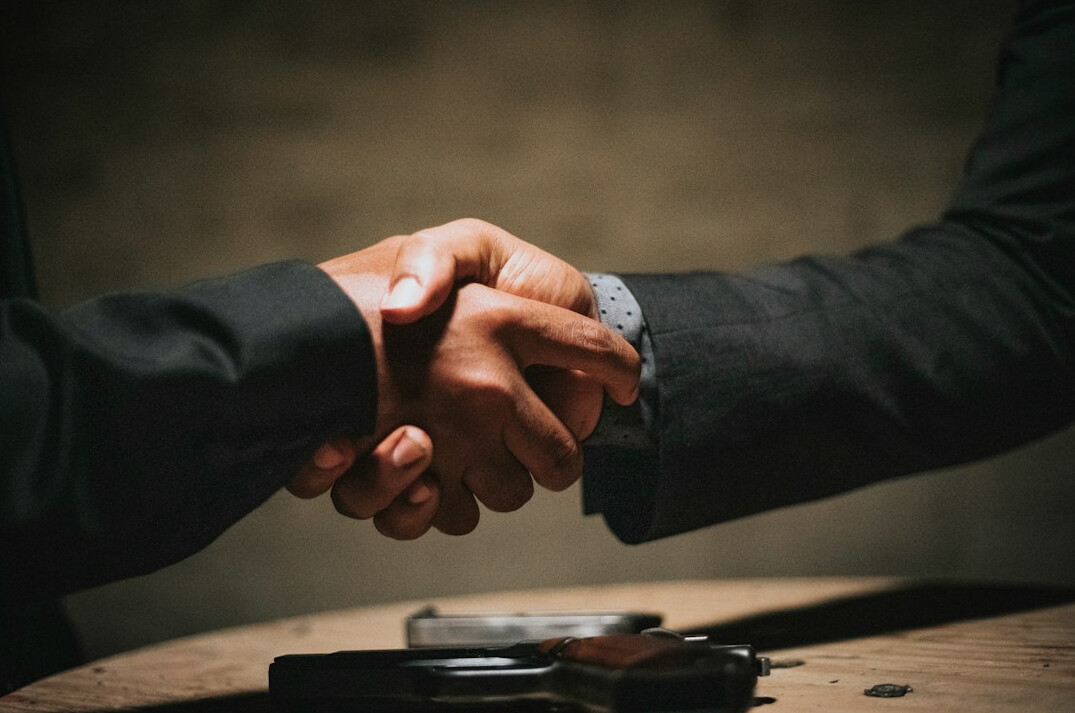 business handshake meeting